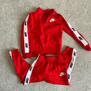 Kids red Nike track suit